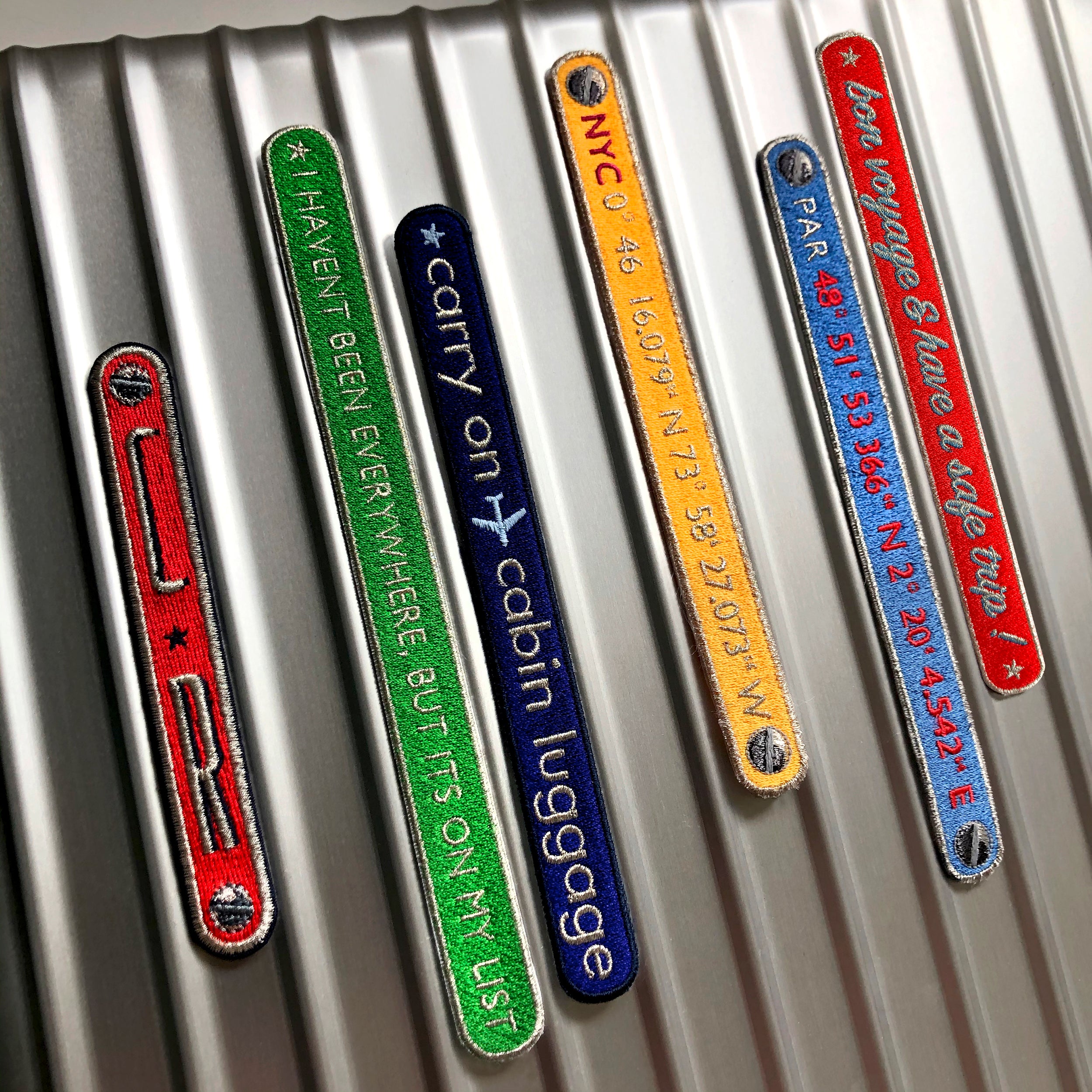 KOFFER PATCH: EVERYWHERE · grün/silber