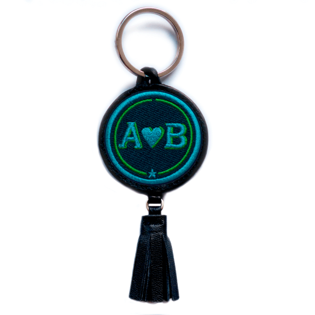 Key ring LOVE turquoise/green with tassel · customizable